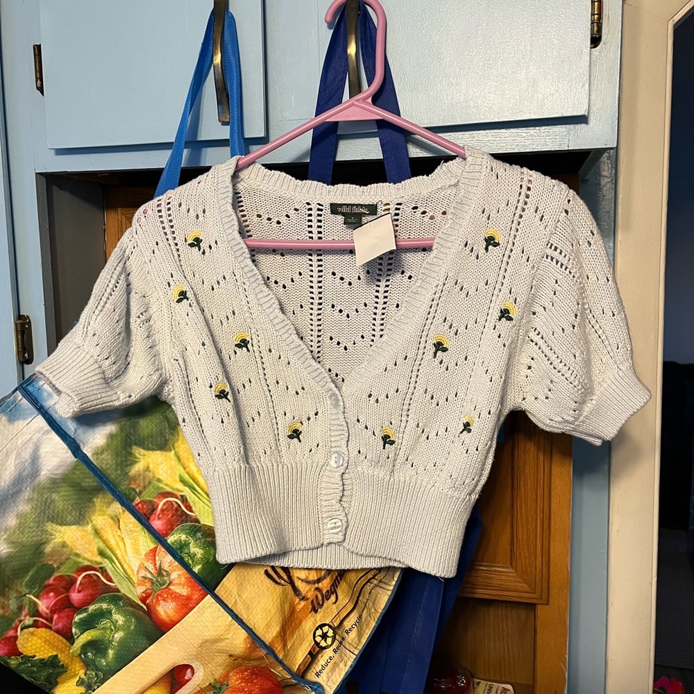 Pale blue sweater kids with yellow flower detail